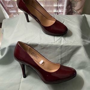 Ladies Burgundy 4 inch patent leather heels.